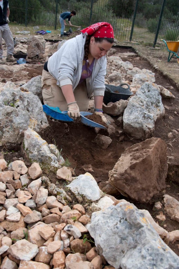 Aida Loy excavating