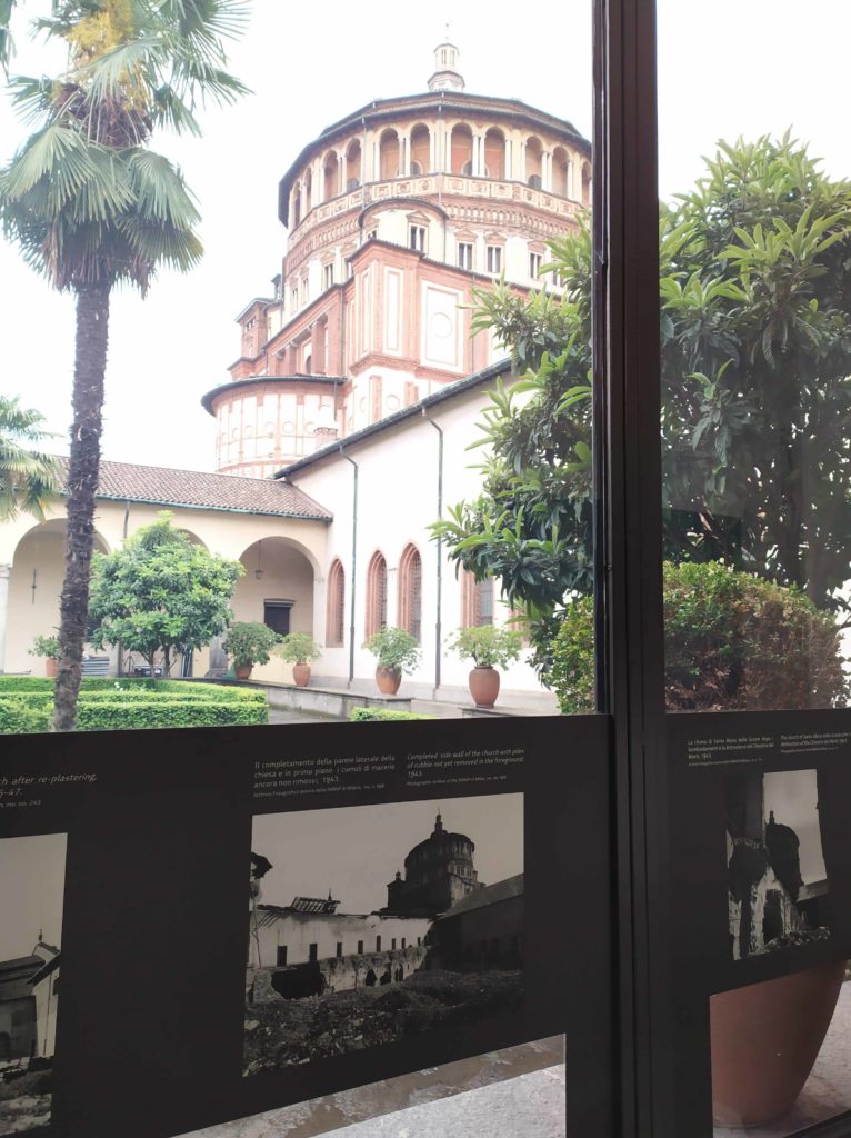 The exhibition: the Chiostro dei Morti with the church of Santa Maria delle Grazie