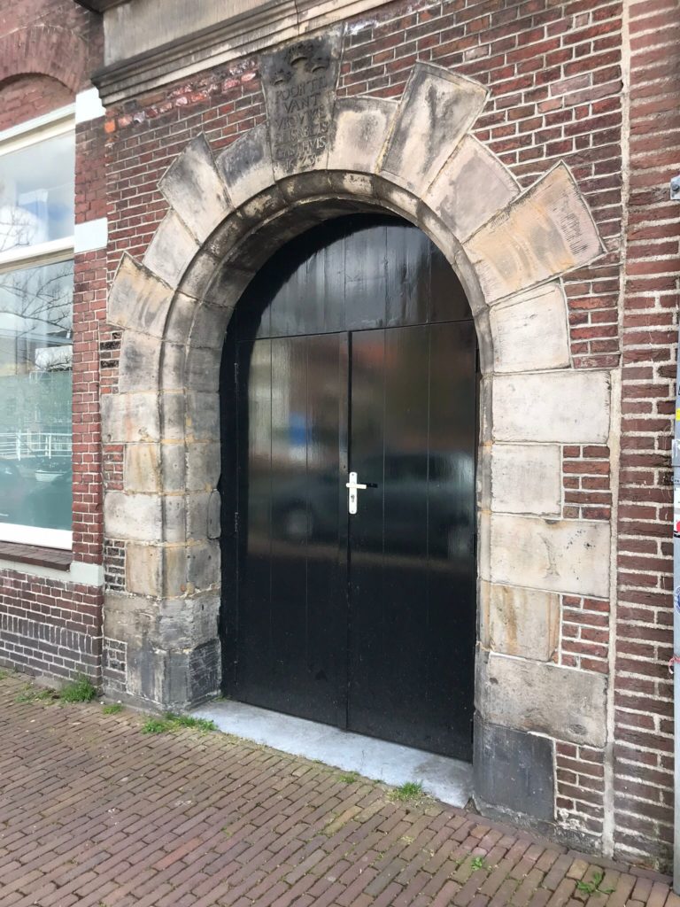 Door with inscription on top