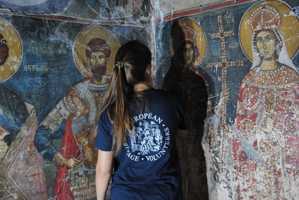 Volunteer working on a fresco